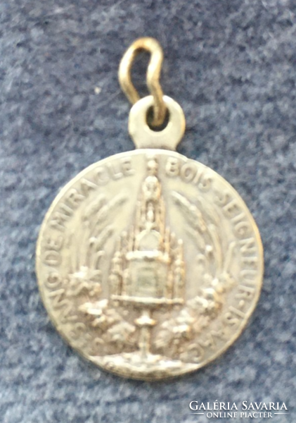 Old silver-plated pendant in memory of Saint Isaac