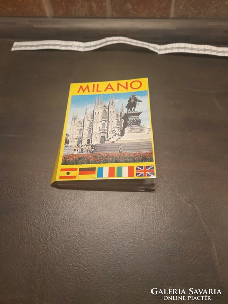 Milan leporello and brochures about European cities all in one