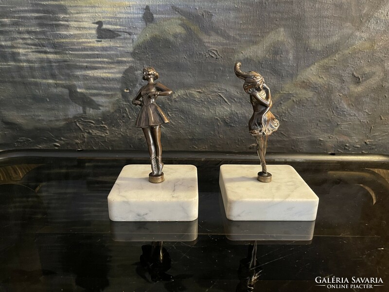 Pair of bronze dancing statues