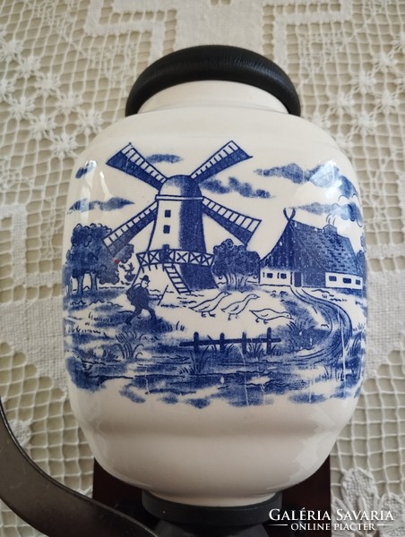 Wall-mounted coffee grinder with a porcelain body, in new condition, with Dutch decoration