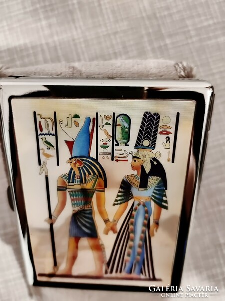 Metal cigarette case decorated with an Egyptian hologram image