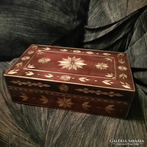 Carved wooden box with inlay decoration