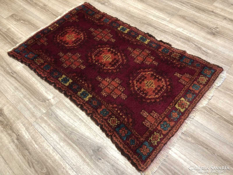 Old hand-knotted woolen Persian rug, 80 x 131 cm