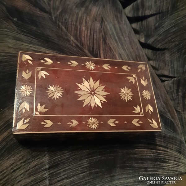 Carved wooden box with inlay decoration