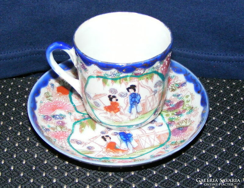 Geisha porcelain cup and saucer