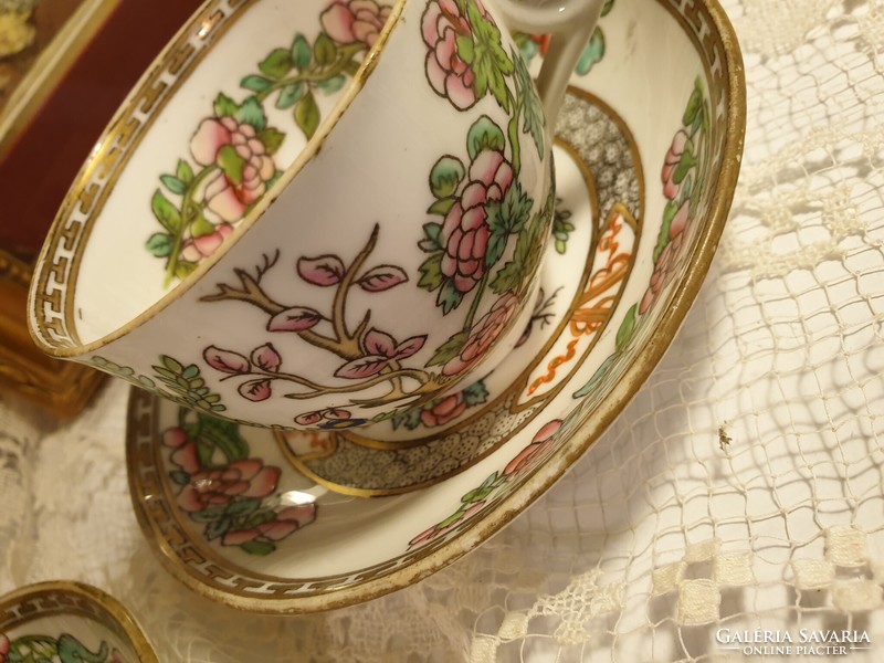 2 marked porcelain teacups with gold edges