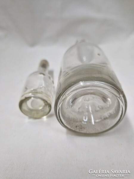 Small and large Virtue diana salted wine bottles, in good condition.