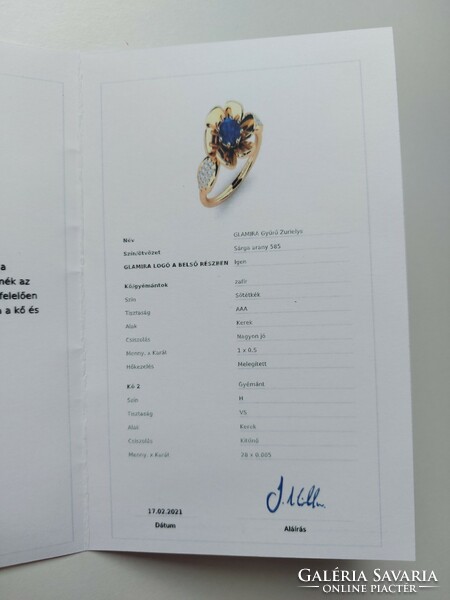 14 carat gold ring with sapphire and diamond