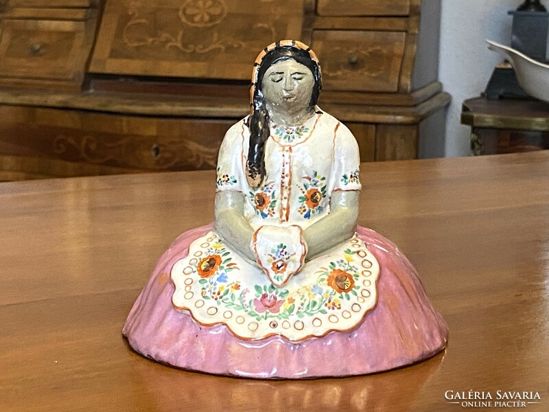 Painted ceramic sculpture of a girl in a big skirt in folk costume, 1968