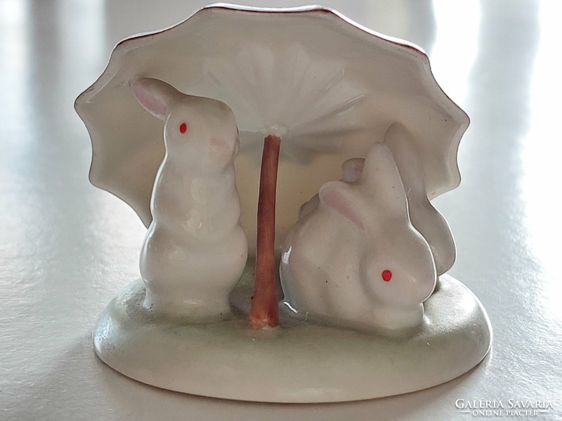 Old Hólloháza porcelain Easter bunny under a yellow umbrella