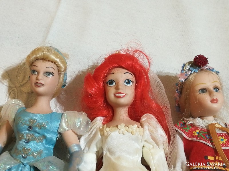 Porcelain doll, princess and folk dress.