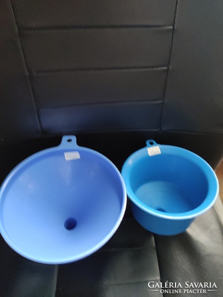 Old-retro plastic funnels in good condition in blue color.
