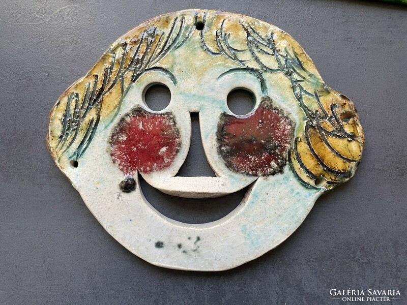 Cheerful little girl, rustic ceramic wall decoration