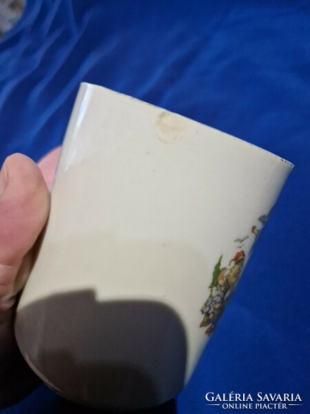 Snow white mug with Zsolnay fairy tale figure is damaged