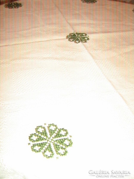 Beautiful elegant hand-embroidered woven tablecloth with lacy edges