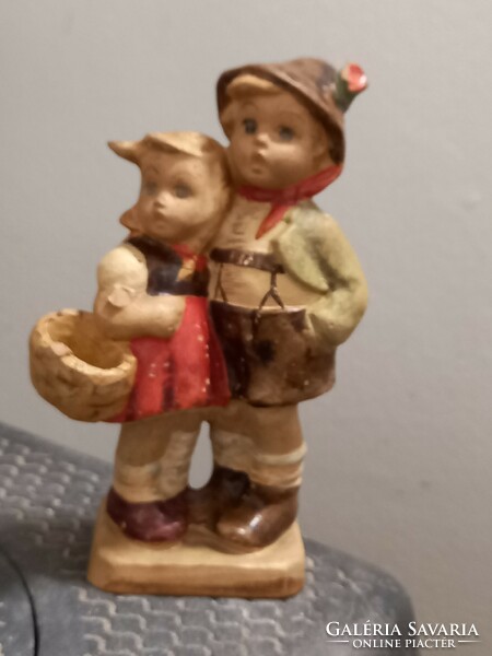 A pair of Hummel-style ceramic children!