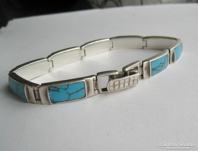 Silver bracelet with turquoise inserts