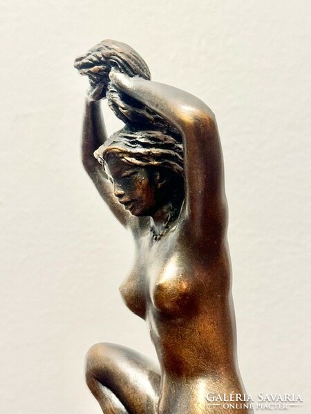 Rácz edit female nude sculpture combing her hair