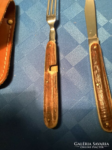 Pocket knife with antler handle and fork in leather case.