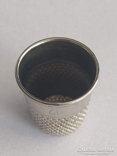 Silver colored thimble!