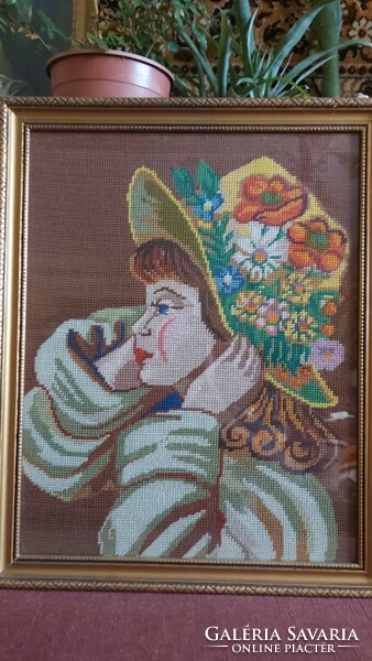 Goblet picture of a lady in a hat with flowers and poppies in a glass frame
