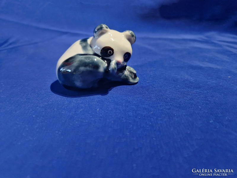 Panda bear scratching its nose, Chinese porcelain