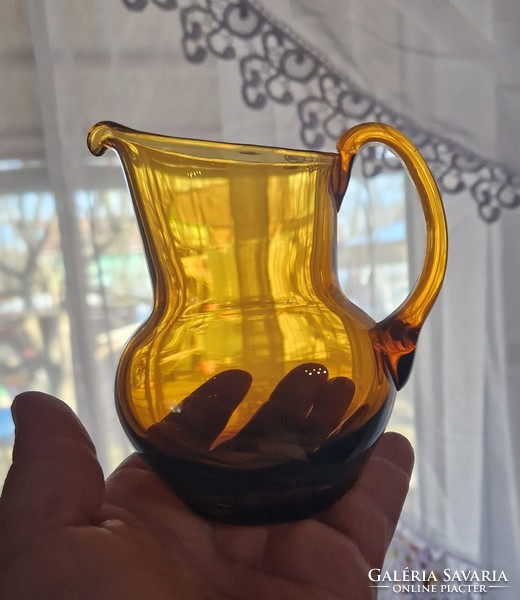 Amber colored small spout, jug