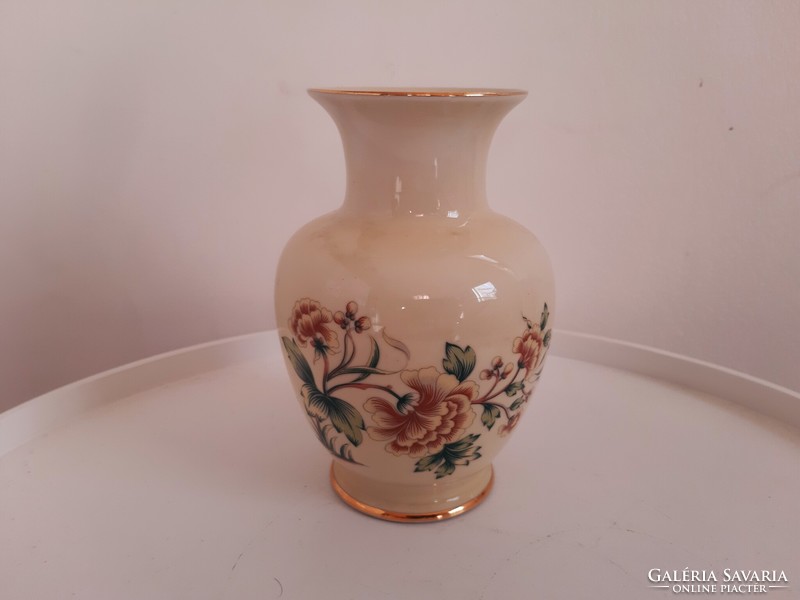 Butter colored vase with Raven House flower pattern