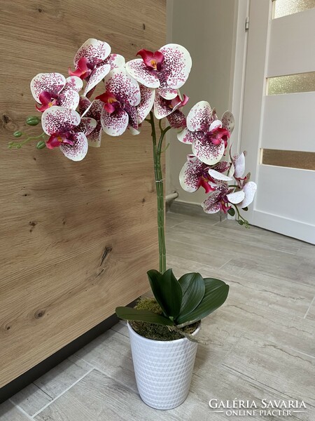 Beautiful maintenance-free orchid flower artificial plant in a ceramic pot for home decoration