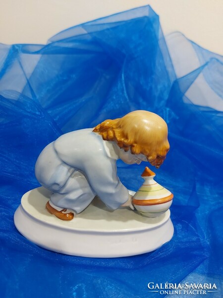 Zsolnay porcelán figura,búgócsiával játszó kisfiú