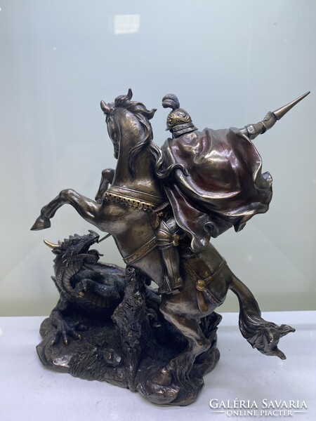 Bronzed statue of St. George the dragon slayer