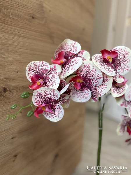 Beautiful maintenance-free orchid flower artificial plant in a ceramic pot for home decoration
