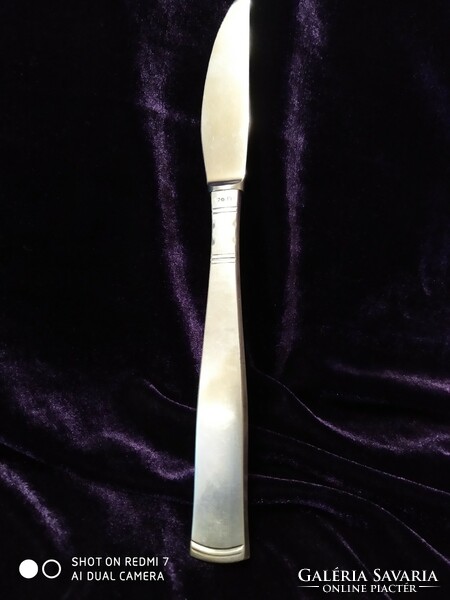 Knife with silver (Swedish 830) handle, stainless steel blade.