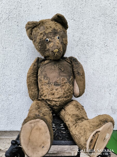 Antique teddy bear teddy bear stuffed with straw antique old brown bear! Save me !