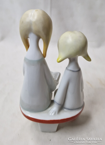 Porcelain figurine of reading girls, designed by Aurél Káldor of Hollóháza, in perfect condition