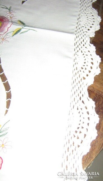Beautiful hand-crocheted floral tablecloth
