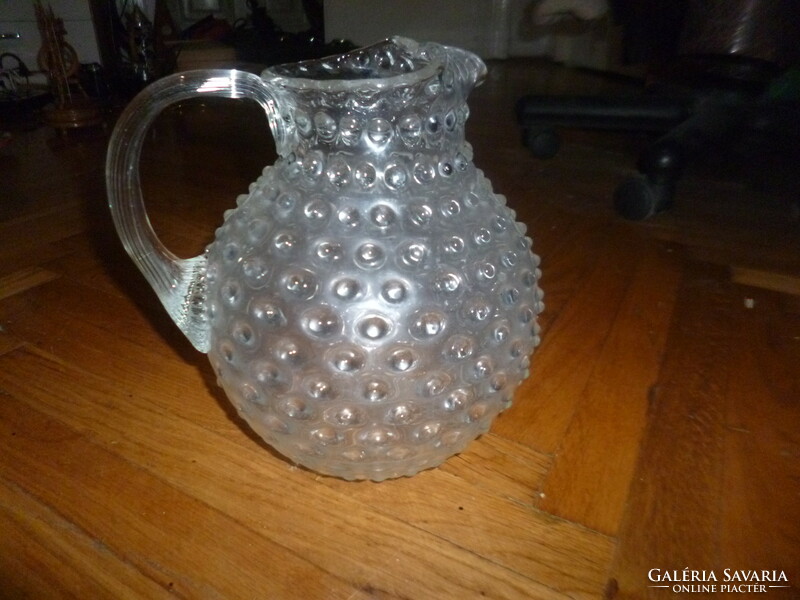 Old large glass jug with cam