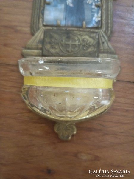 Old holy water container.