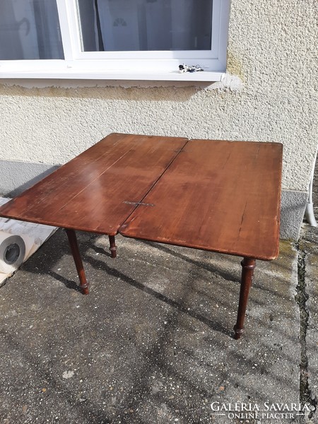 Antique folding table with beautiful legs