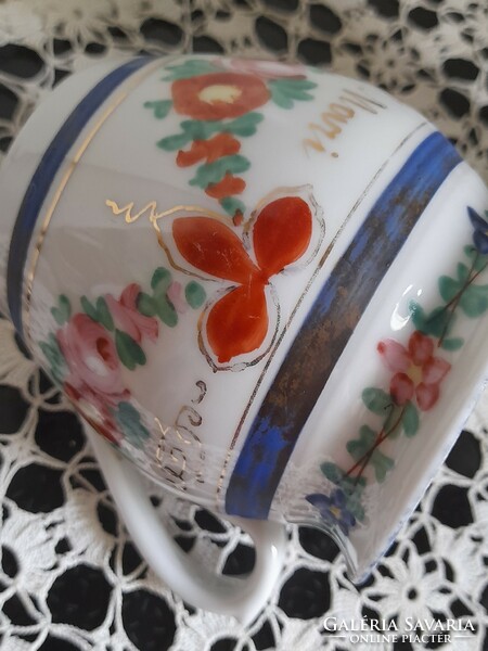 Antique floral cup with 