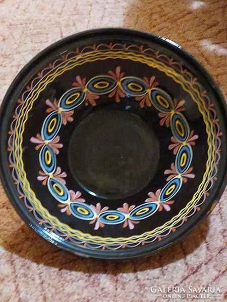 Ceramic wall plate with a diameter of 31 cm.