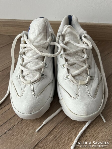 Fila white sports shoes
