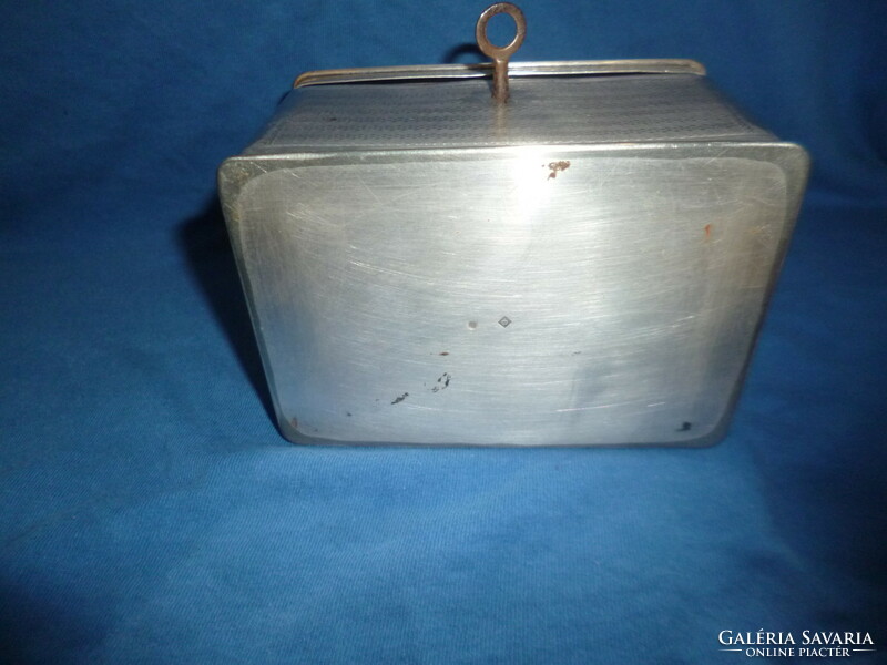 Antique decorative silver-plated jewelry box with key