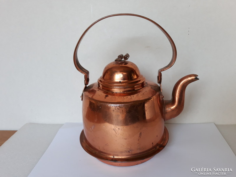 Antique copper teapot with patina