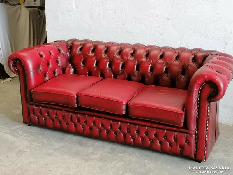 Chesterfield sofa with real cowhide upholstery