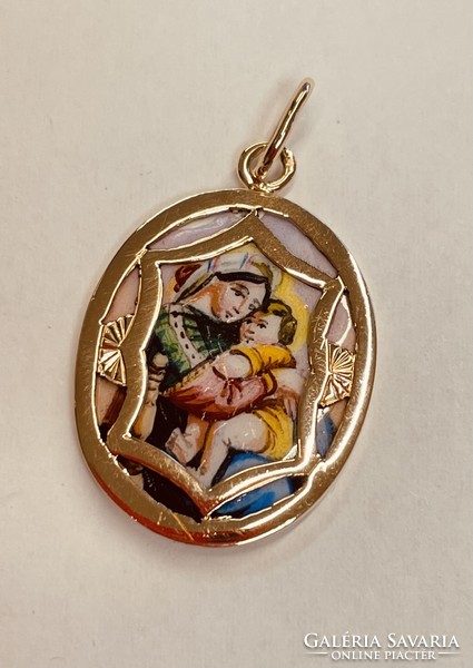 Old Mary with her child pendant in a gold frame