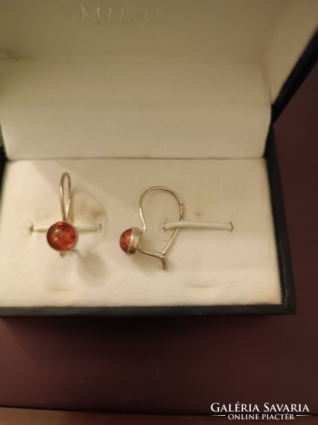 Old silver earrings with amber stones