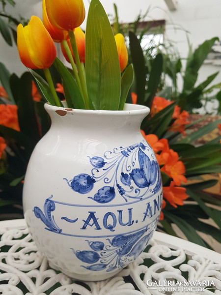 Chubby ceramic vase with blue decor