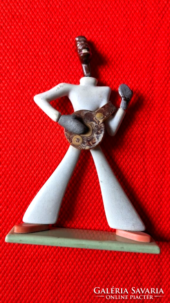 Metal figure of a Negro with a banjo