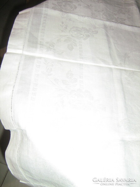 Large damask napkin with a beautiful white rose pattern